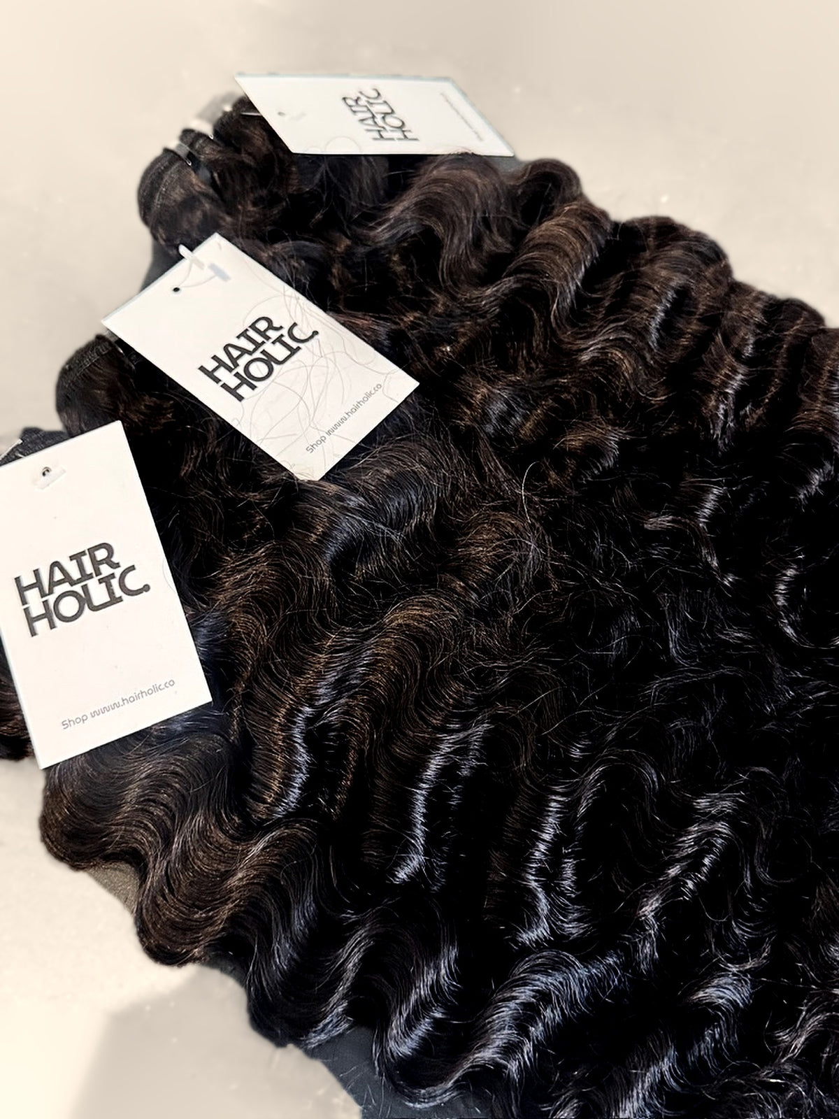 Vietnamese raw deep wave hair bundles with Hairholic tags